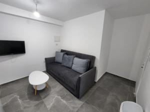 Posezení v ubytování קסם של דירה