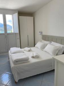 Ένα ή περισσότερα κρεβάτια σε δωμάτιο στο SUL MARE SARDEGNA VILLA CLITIA