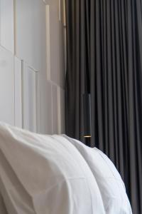 Postel nebo postele na pokoji v ubytování Center Hotel