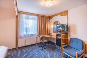 Sjónvarps- og/eða afþreyingartæki á Hotel Kern Buam