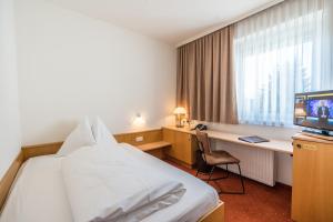 Sjónvarps- og/eða afþreyingartæki á Hotel Kern Buam