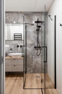 Koupelna v ubytování Žalia kopa Metropolis Vilnius + 20 fotografií