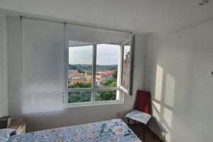 Łóżko lub łóżka w pokoju w obiekcie HyP - A Casa da Fina