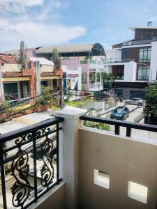 a balcony with a view of a city at Huy Hoàng Motel - Cần Thơ in Can Tho