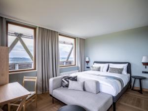 Postel nebo postele na pokoji v ubytování Falkensteiner Hotel Bad Leonfelden Superior