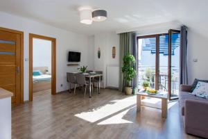 Telewizja i/lub zestaw kina domowego w obiekcie MikroKlimat