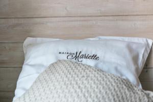 Postel nebo postele na pokoji v ubytování Maison Mariette