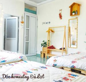 Postel nebo postele na pokoji v ubytování Dốc homestay Đà Lạt