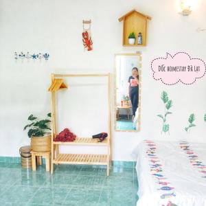 Postel nebo postele na pokoji v ubytování Dốc homestay Đà Lạt