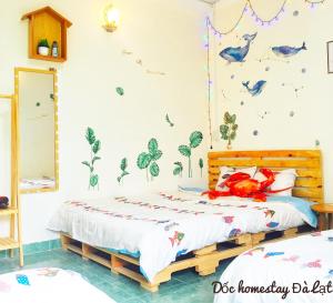 Postel nebo postele na pokoji v ubytování Dốc homestay Đà Lạt