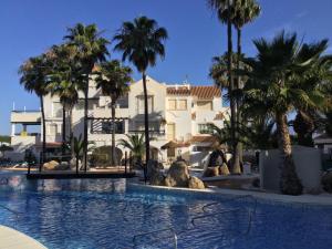 The swimming pool at or close to La Perla Azul - Terraza panorámica al Sol