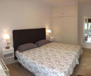 Posteľ alebo postele v izbe v ubytovaní Acogedor y precioso apartamento + parking privado