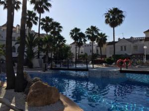 The swimming pool at or close to La Perla Azul - Terraza panorámica al Sol