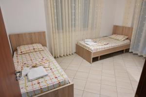 Voodi või voodid majutusasutuse Iris apartaments toas