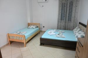 Voodi või voodid majutusasutuse Iris apartaments toas