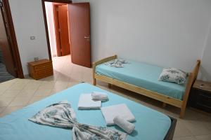 Voodi või voodid majutusasutuse Iris apartaments toas