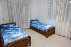 Voodi või voodid majutusasutuse Iris apartaments toas