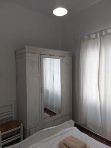 Postel nebo postele na pokoji v ubytování Kardiani Village Home