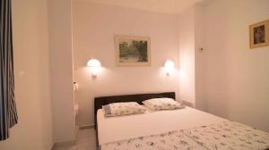 Fotografie z fotogalerie ubytování Apartments in Mali Losinj 14950 v destinaci Mali Lošinj