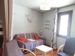 Posezení v ubytování Apartamentos Grifo Vacances Grizzly