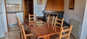 Kuchyň nebo kuchyňský kout v ubytování Apartamentos Grifo Vacances Grizzly