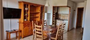 TV a/nebo společenská místnost v ubytování Apartamentos Grifo Vacances Grizzly
