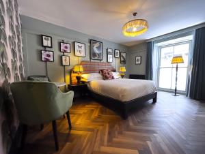 Ліжко або ліжка в номері The Palm