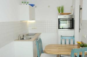 Kuchyň nebo kuchyňský kout v ubytování Villa Karola Ferienwohnung 45403