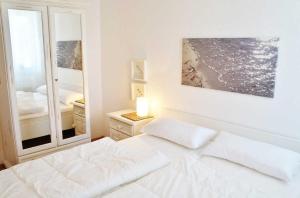 Postel nebo postele na pokoji v ubytování Villa Karola Ferienwohnung 45403