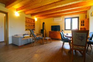 TV a/nebo společenská místnost v ubytování House Stella 1319