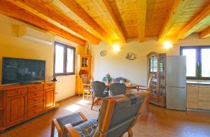 TV a/nebo společenská místnost v ubytování House Stella 1319