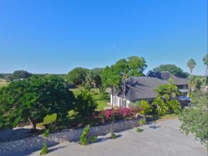 an aerial view of a house with trees and flowers at La Rochelle Lodge Namibia Tsumeb in Tsumeb