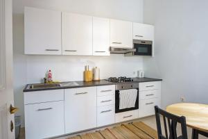 Kuchyň nebo kuchyňský kout v ubytování Vienna City Apartments Unteres Belvedere