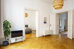 TV a/nebo společenská místnost v ubytování Vienna City Apartments Unteres Belvedere