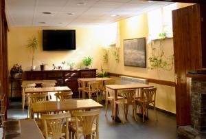 Μια τηλεόραση ή/και κέντρο ψυχαγωγίας στο Hotel La Creu by RdA Hotels