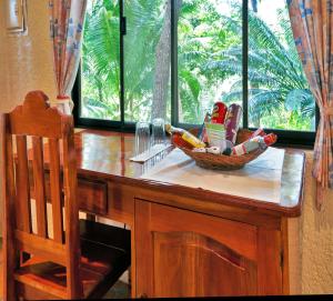 a kitchen counter with a bowl of food on it at Easy Diving and Beach Resort in Sipalay