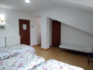 Posteľ alebo postele v izbe v ubytovaní Hotel Salldemar