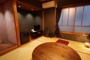 Letto o letti in una camera di 飛騨金山 古民家宿 恩家 -おんや-