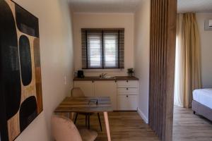 Ένα ή περισσότερα κρεβάτια σε δωμάτιο στο Cristina Apartments