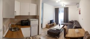 Kuchyň nebo kuchyňský kout v ubytování Aqua Lux Apartman