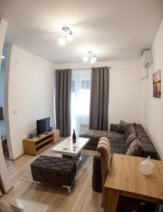 Posezení v ubytování Aqua Lux Apartman