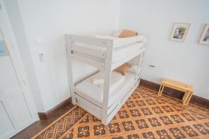 Postel nebo postele na pokoji v ubytování Casa de la Alegría