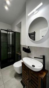 Ванная комната в Chill Apartment Żeromskiego