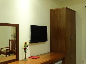 TV a/nebo společenská místnost v ubytování Hoa Vinh Hotel
