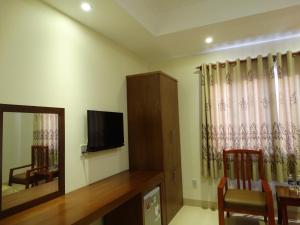 TV a/nebo společenská místnost v ubytování Hoa Vinh Hotel