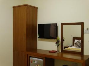 TV a/nebo společenská místnost v ubytování Hoa Vinh Hotel