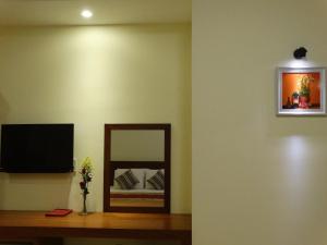 TV a/nebo společenská místnost v ubytování Hoa Vinh Hotel