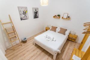 Postel nebo postele na pokoji v ubytování Casa de la Alegría