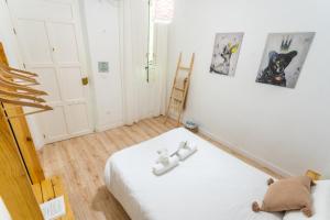 Postel nebo postele na pokoji v ubytování Casa de la Alegría