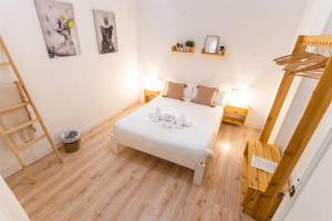 Postel nebo postele na pokoji v ubytování Casa de la Alegría